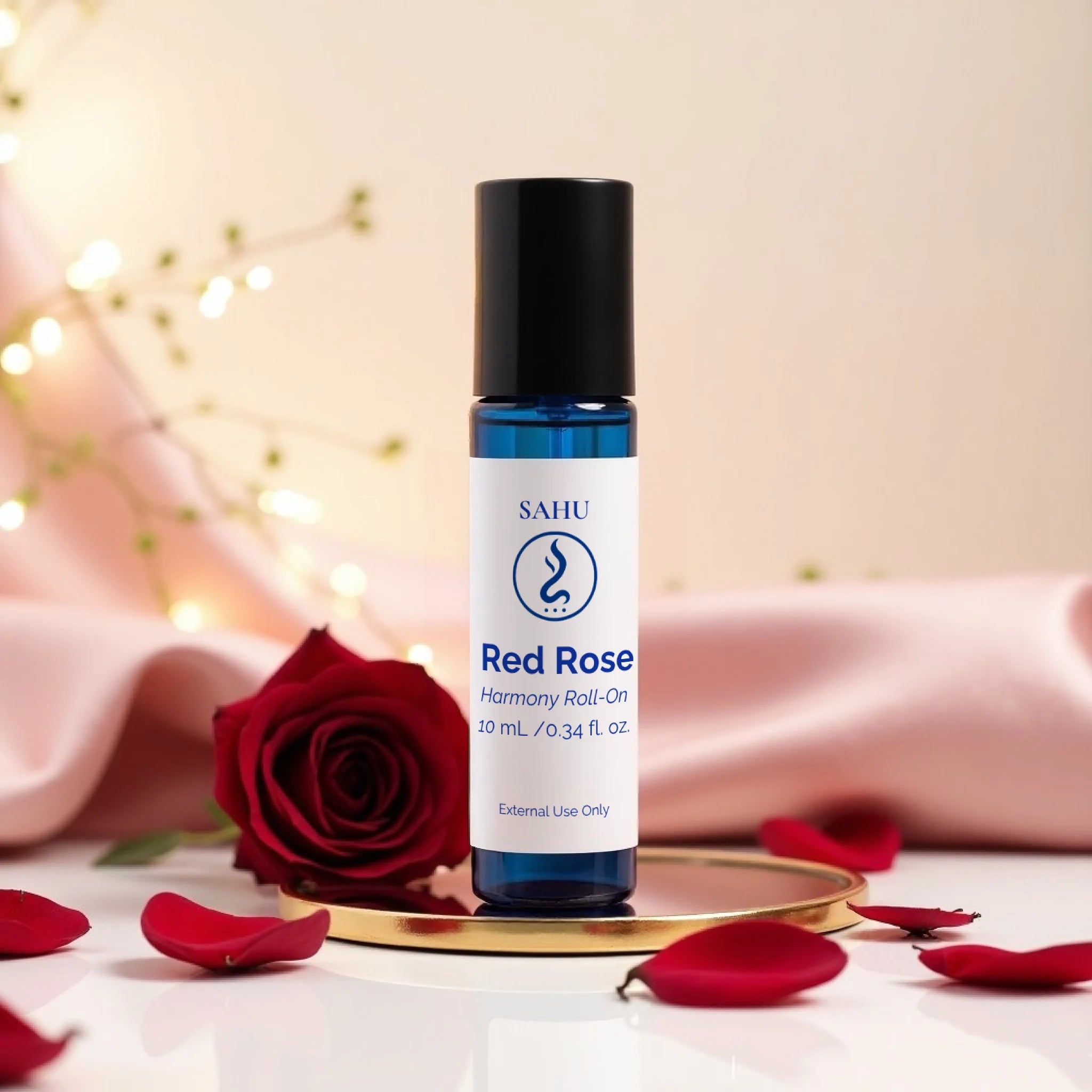 Sahu Red Rose Roll-On bottle with a red rose and petals on a soft background